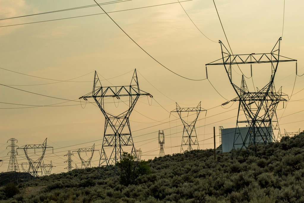 silhouette of electric utility post